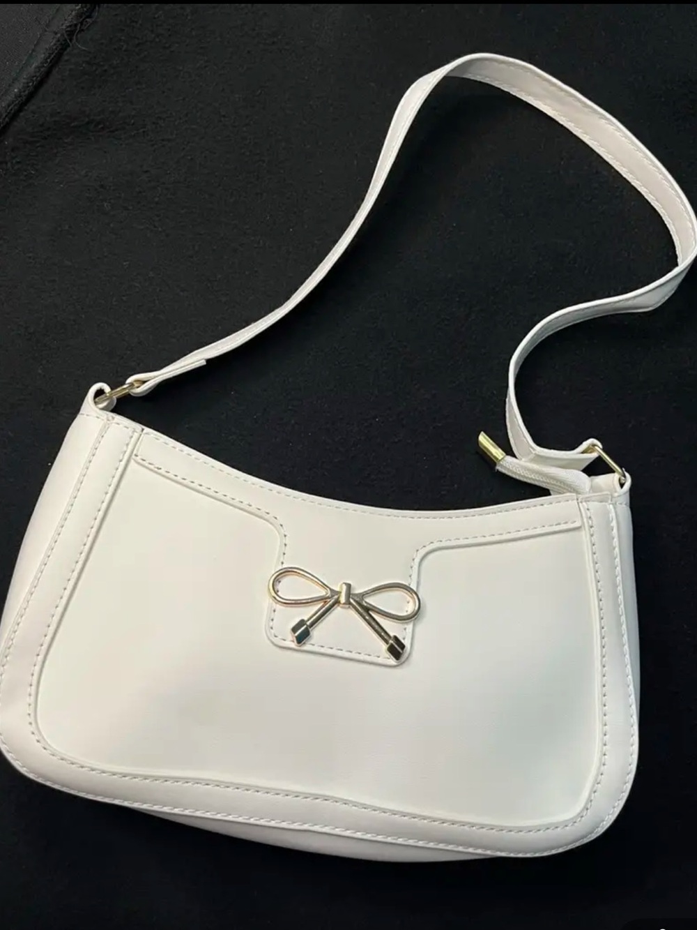 Chic White Shoulder Bag with Gold Bow Accent